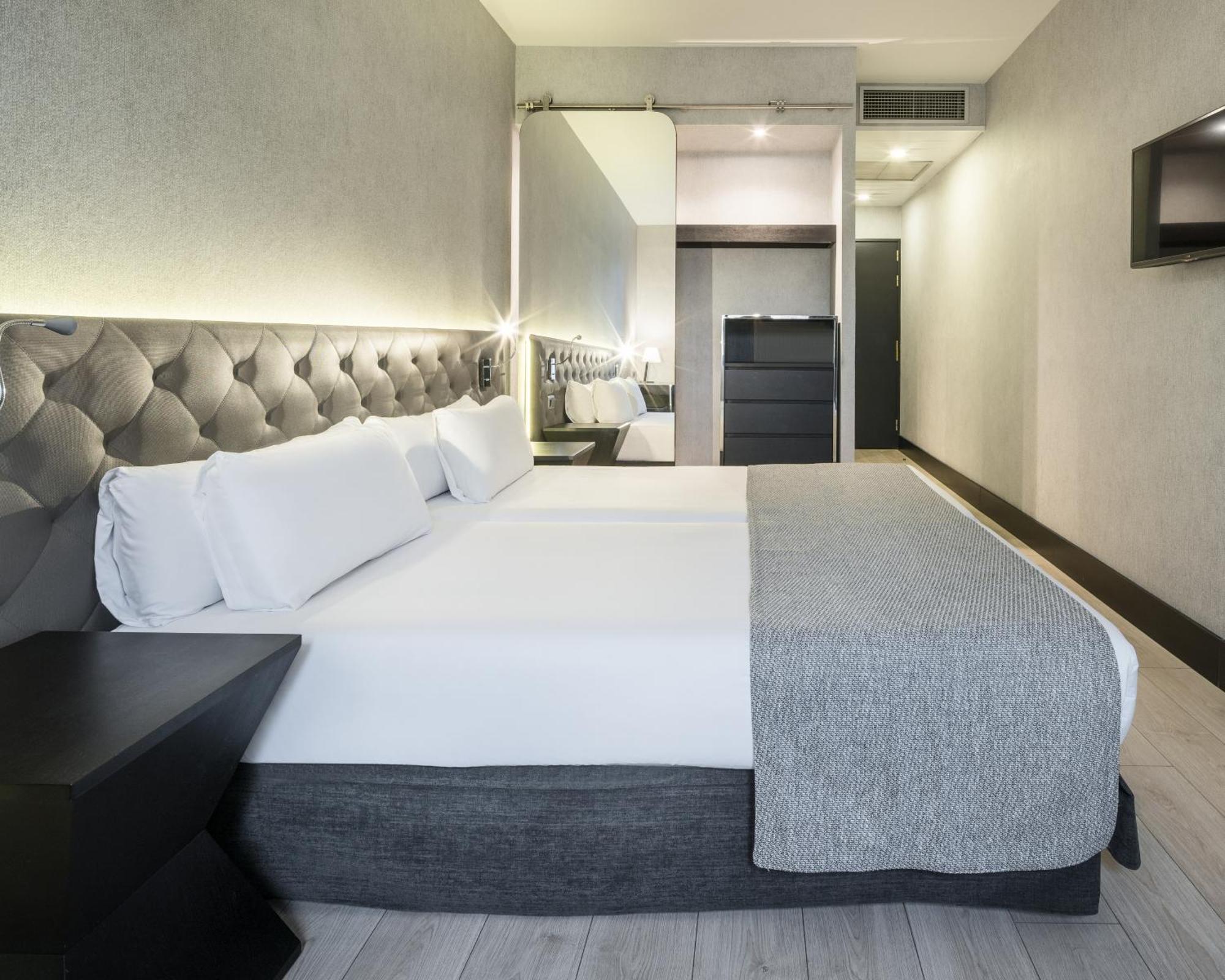 Doppel- oder Zweibettzimmer